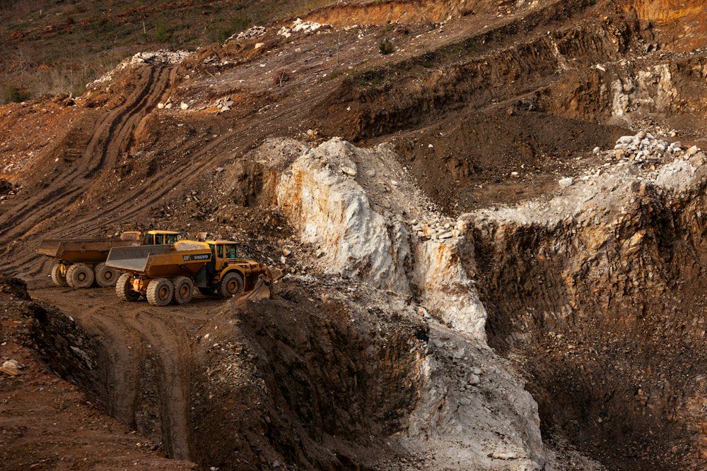 Articulated dump truck on a haul road in a pit