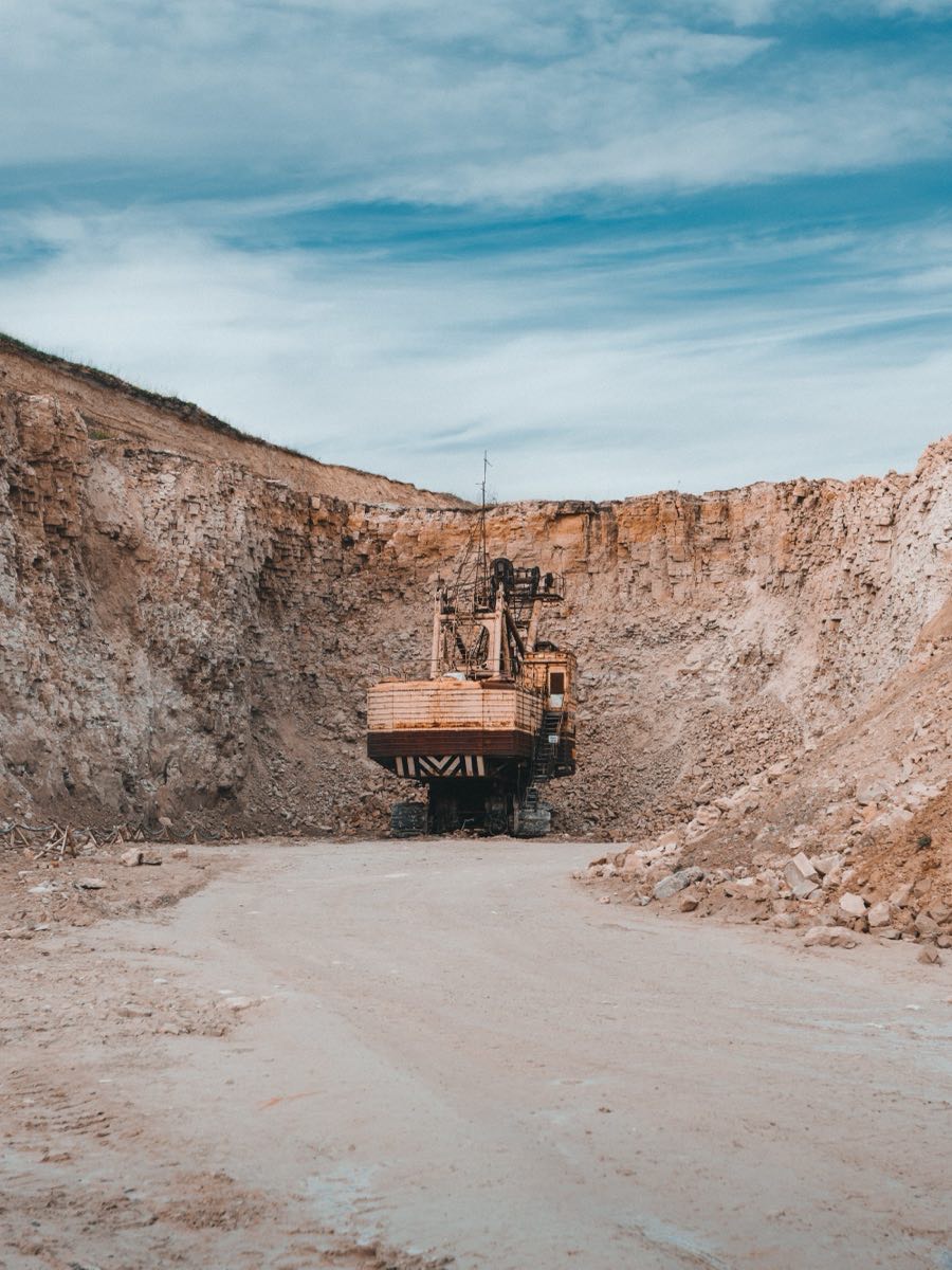 Excavator in an open-pit quarry